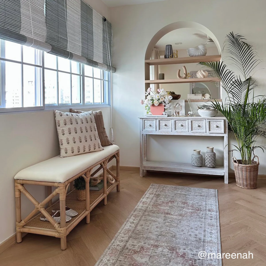 woven rattan bench used as seating in a bright living room