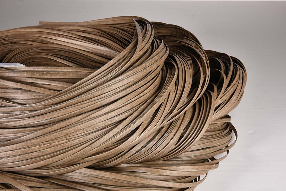 Close-up of raw rattan strips used for weaving and furniture making