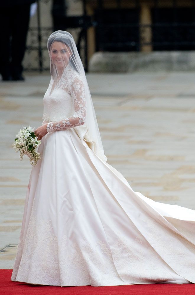 Princess Kate Middleton with her bridal bouquet lily of the valley